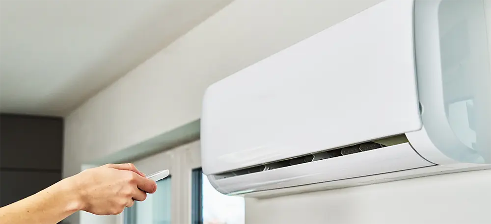 Utilisation d’une télécommande pour ajuster un climatiseur mural intérieur